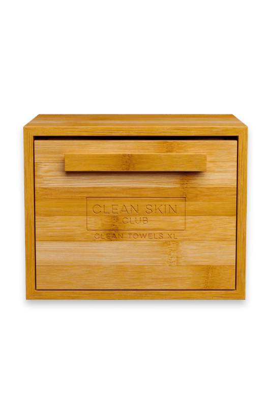 Clean Skin Club Lux Bamboo Box – reusable bamboo tissue box holder designed to fit Clean Towels, adds elegance and function to your skincare space at West Em Medical Spa